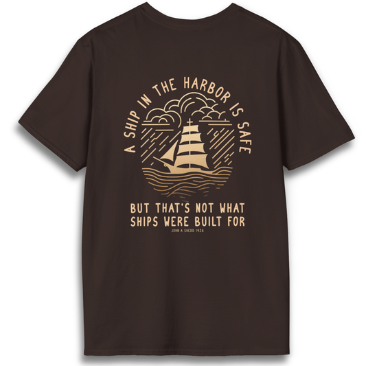 Printify T-Shirt Dark Chocolate / S A Ship in the Harbor Is Safe - Back Design