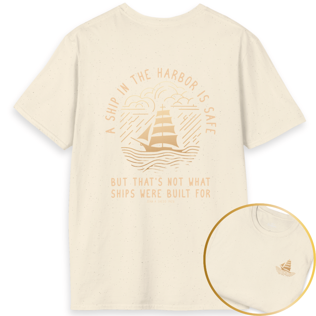 Printify T-Shirt Natural / S A Ship in the Harbor Is Safe