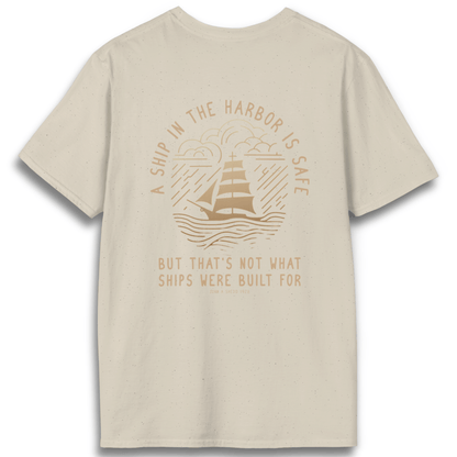 Printify T-Shirt Natural / S A Ship in the Harbor Is Safe - Back Design