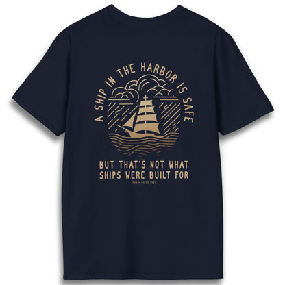 Printify T-Shirt Navy / XS A Ship in the Harbor Is Safe - Back Design